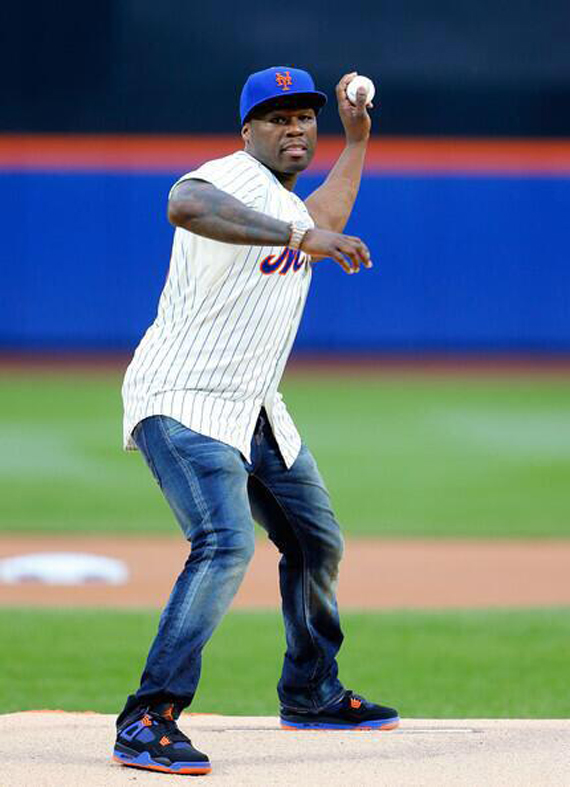 50 Cent Throws Out First Pitch in Air Jordan 4 