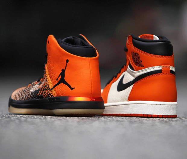 pink and black jordans 1s