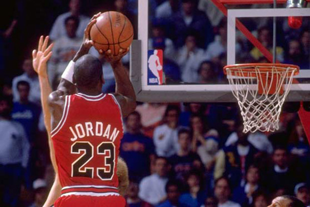Basketball: NBA Playoffs. Rear view of Chicago Bulls Michael Jordan #23 in action, shooting vs. the Cleveland Cavaliers Craig Ehlo #3. Jordan w. game winning shot.